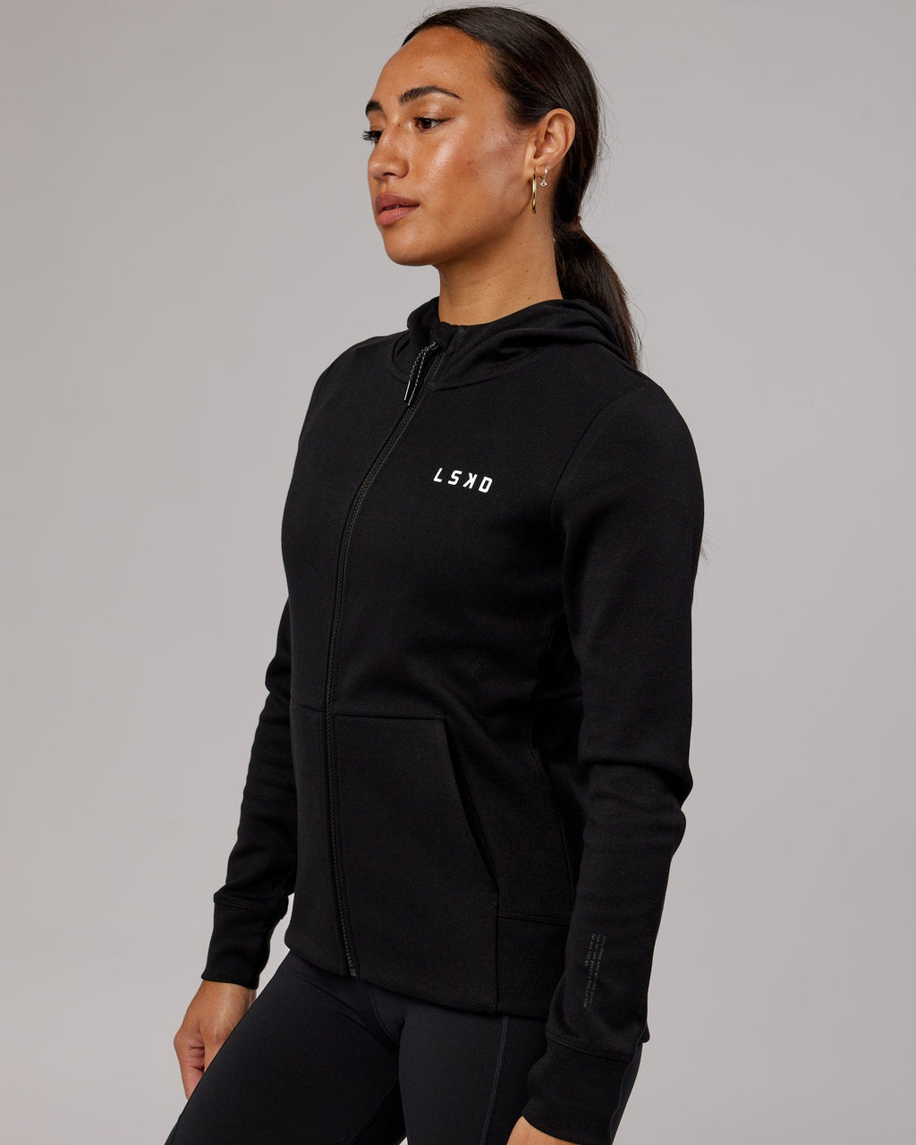 Model wearing Athlete ForgedFleece Zip Through Hoodie - Black
