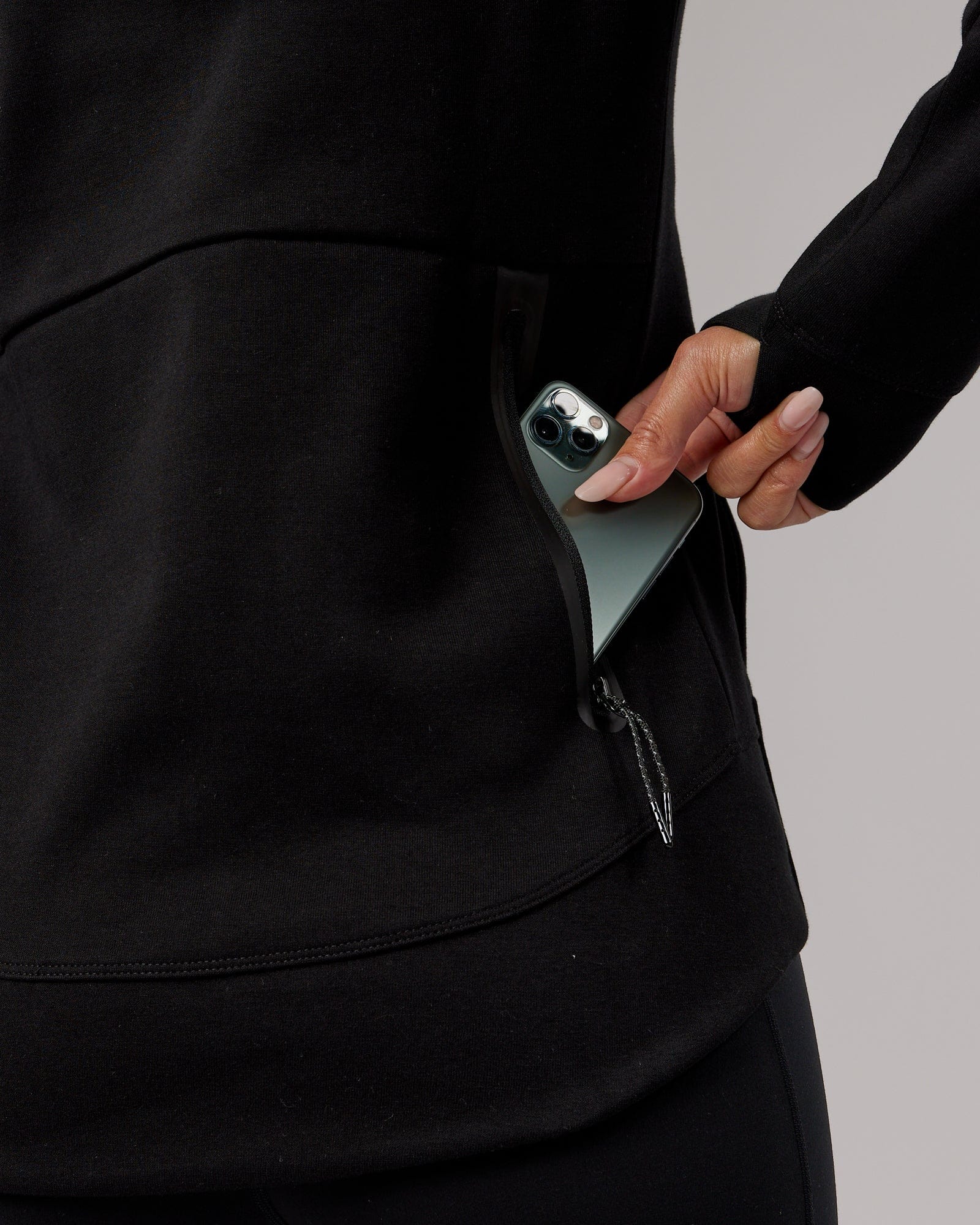 Model wearing Athlete ForgedFleece Zip Through Hoodie - Black