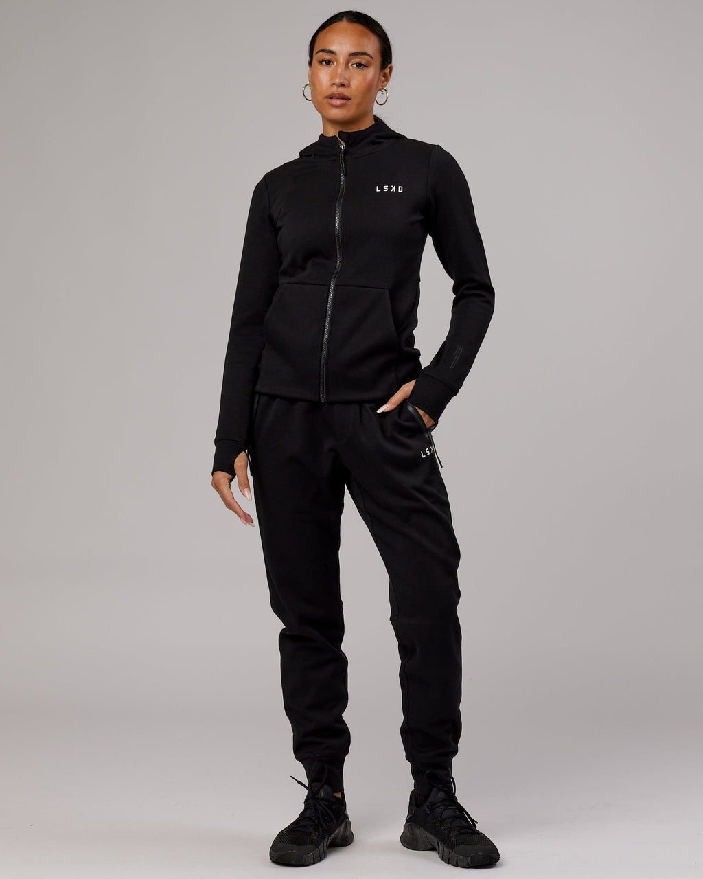 Model wearing Athlete ForgedFleece Zip Through Hoodie - Black