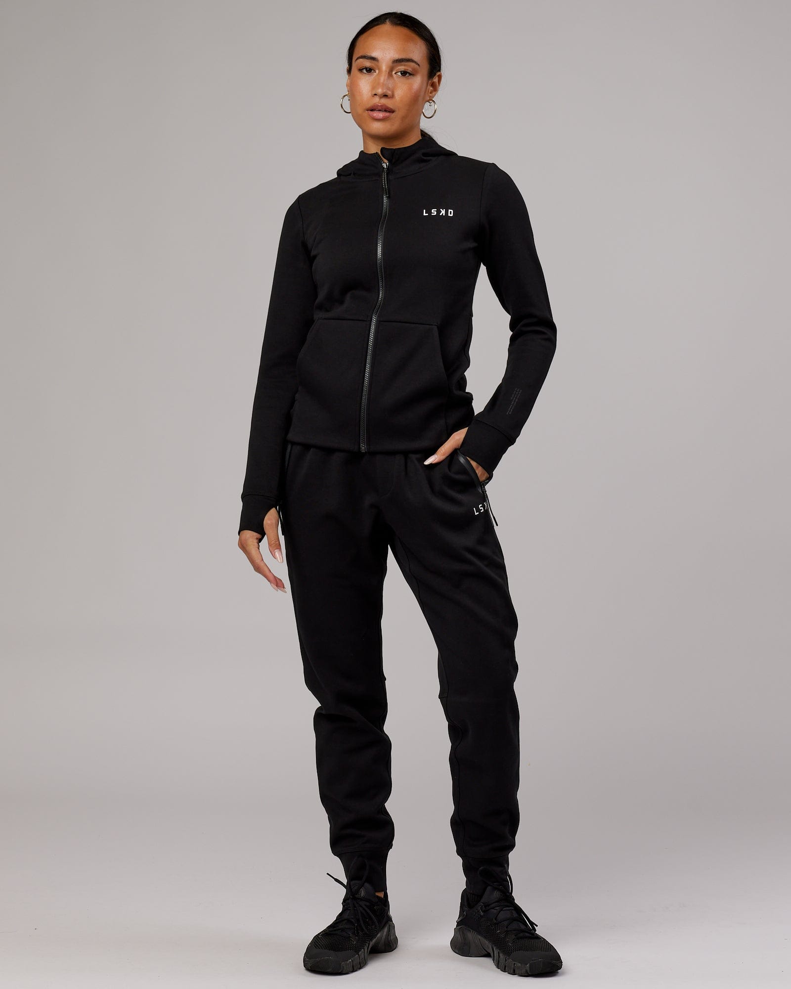Model wearing Athlete ForgedFleece Zip Through Hoodie - Black