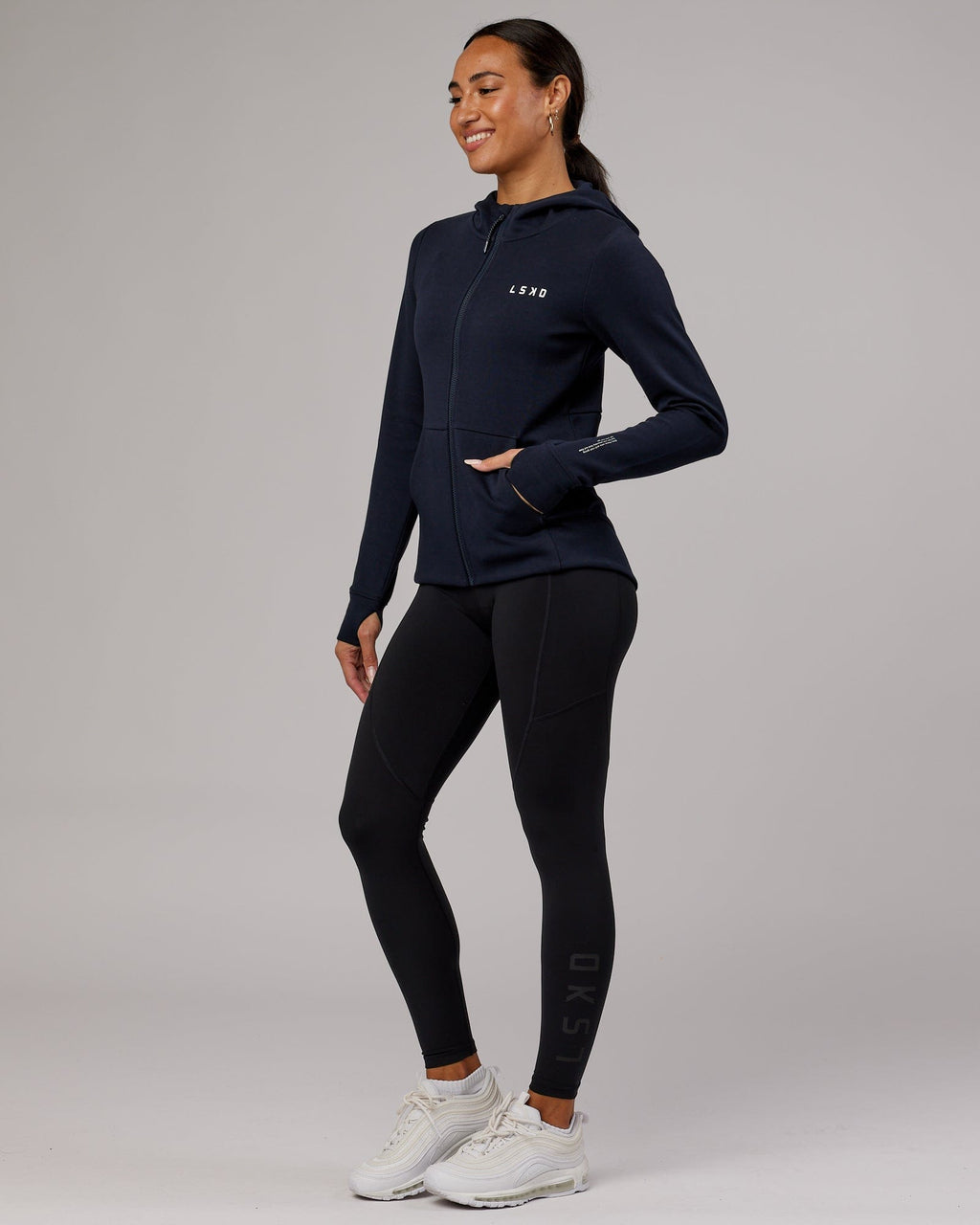 Model wearing Athlete ForgedFleece Zip Through Hoodie - Dark Navy