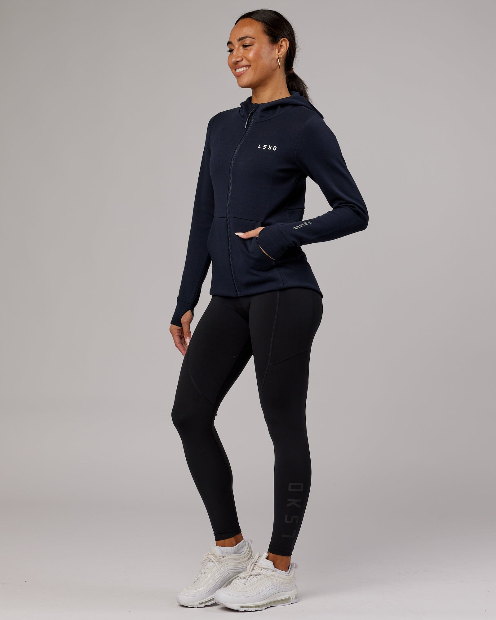 Model wearing Athlete ForgedFleece Zip Through Hoodie - Dark Navy