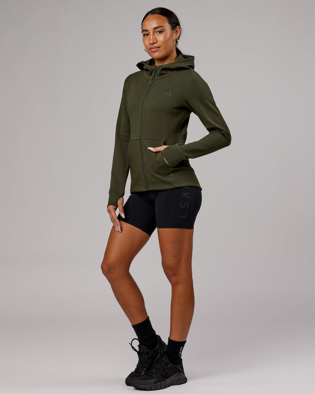 Model wearing Athlete ForgedFleece Zip Through Hoodie - Forest Night