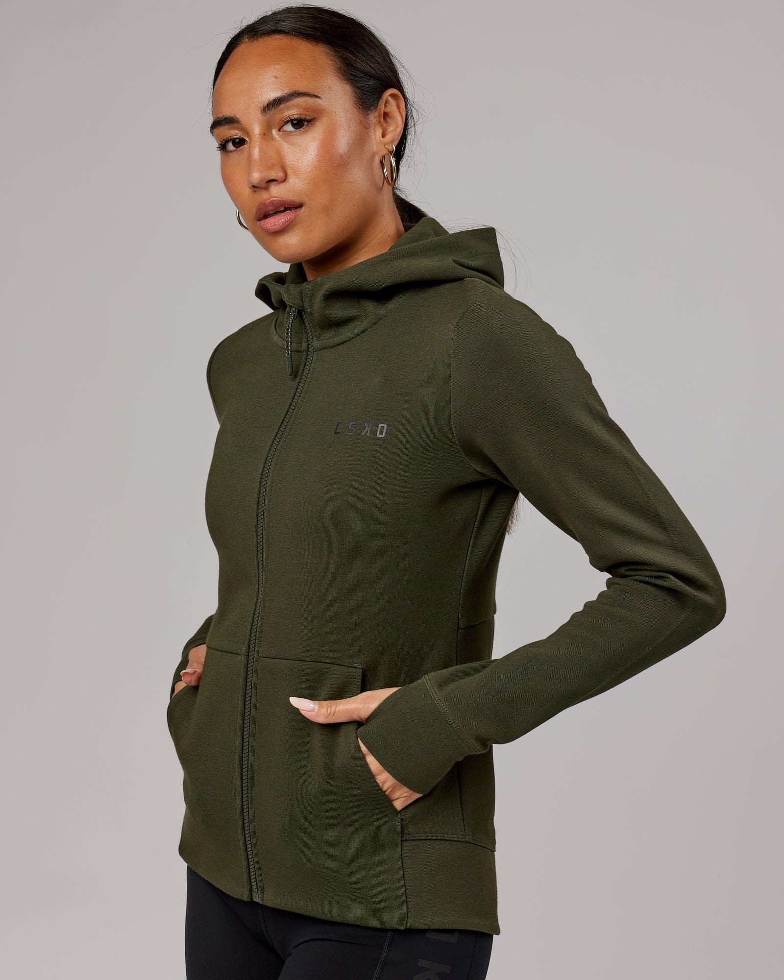 Model wearing Athlete ForgedFleece Zip Through Hoodie - Forest Night
