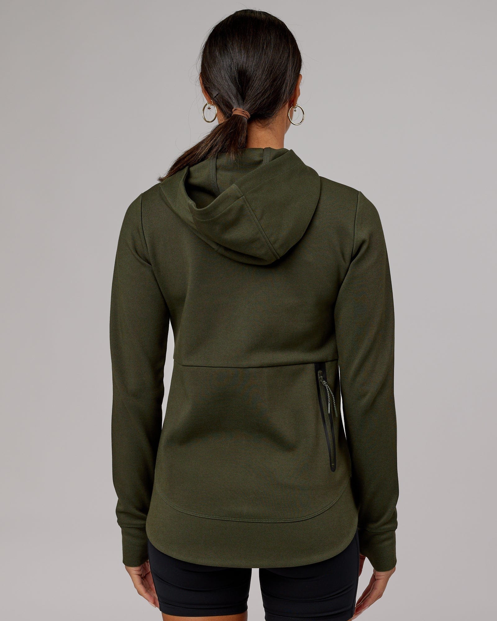 Model wearing Athlete ForgedFleece Zip Through Hoodie - Forest Night