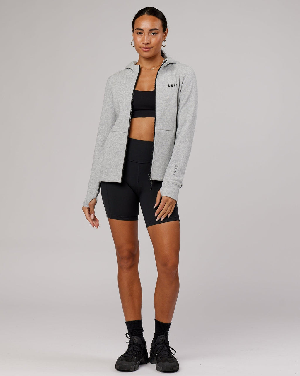 Model wearing Athlete ForgedFleece Zip Through Hoodie - Lt Grey Marl