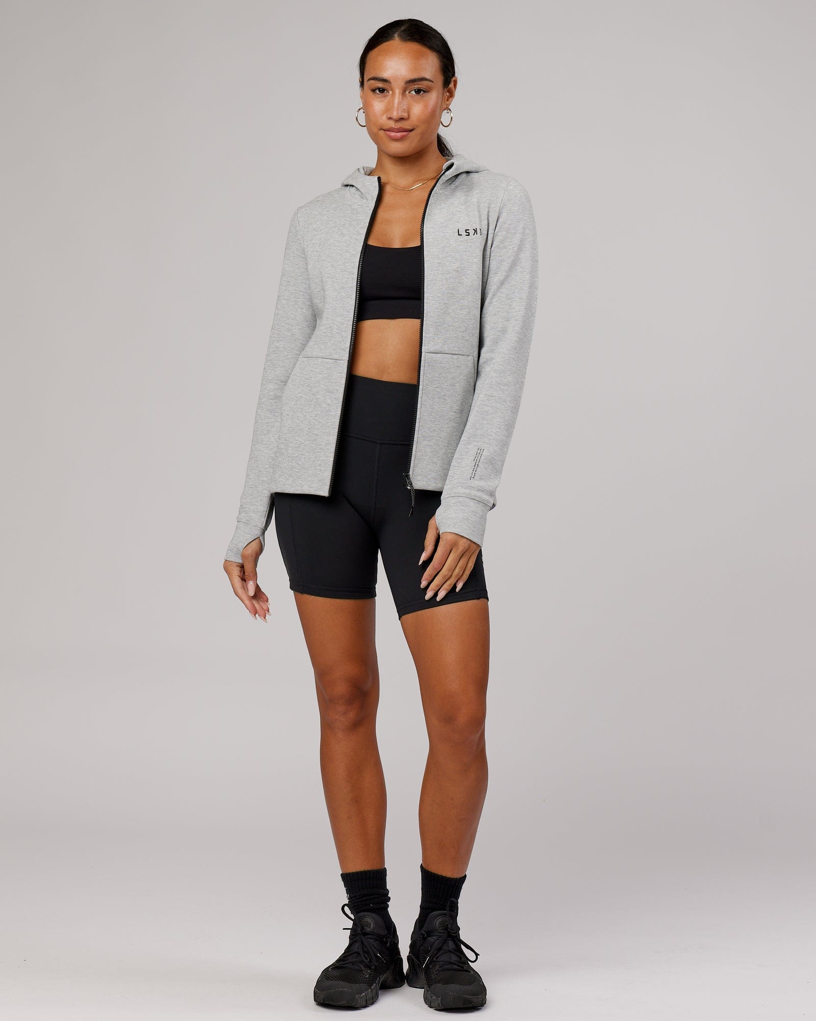 Model wearing Athlete ForgedFleece Zip Through Hoodie - Lt Grey Marl