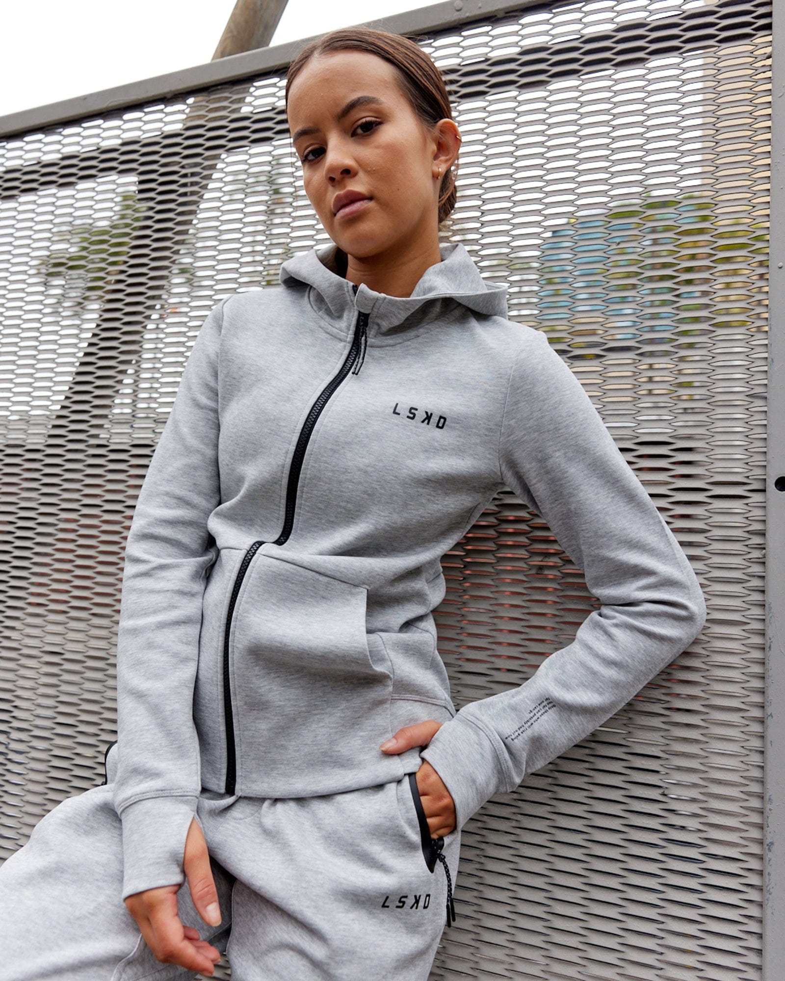 Model wearing Athlete ForgedFleece Zip Through Hoodie - Lt Grey Marl