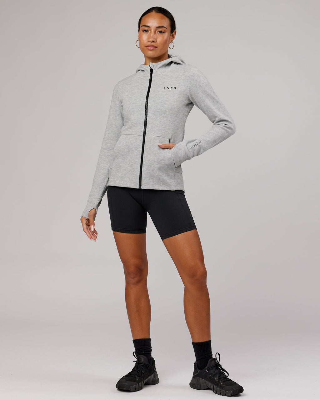 Model wearing Athlete ForgedFleece Zip Through Hoodie - Lt Grey Marl