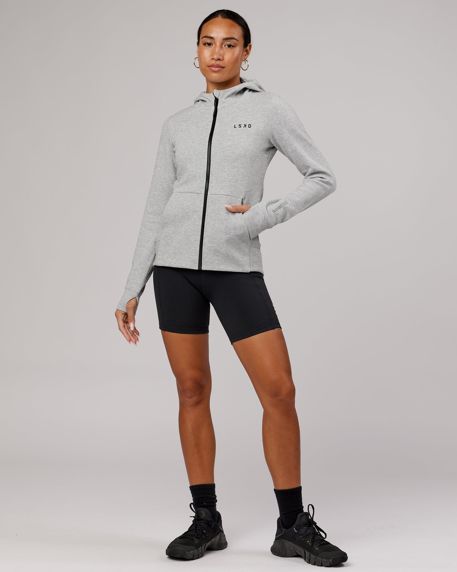 Model wearing Athlete ForgedFleece Zip Through Hoodie - Lt Grey Marl