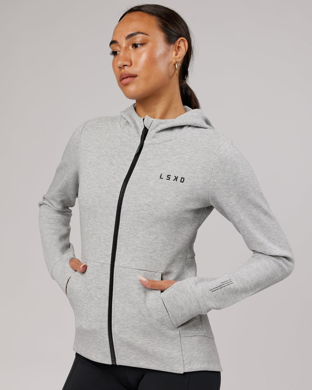 Model wearing Athlete ForgedFleece Zip Through Hoodie - Lt Grey Marl