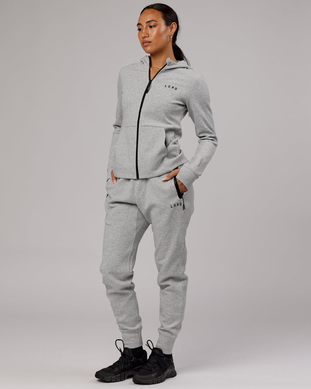 Model wearing Womens Athlete ForgedFleece Trackpant - Lt Grey Marl