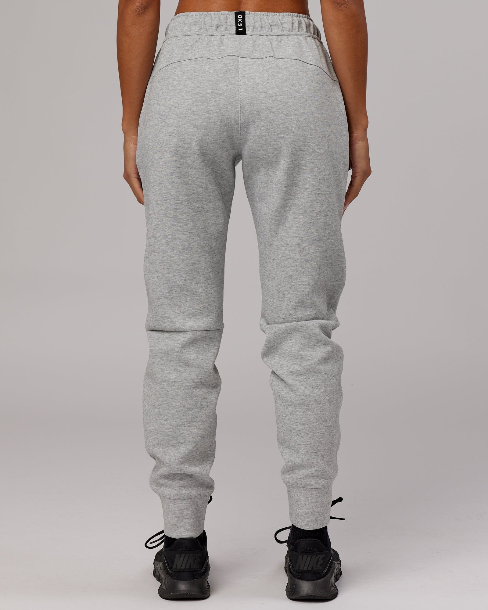 Model wearing Womens Athlete ForgedFleece Trackpant - Lt Grey Marl