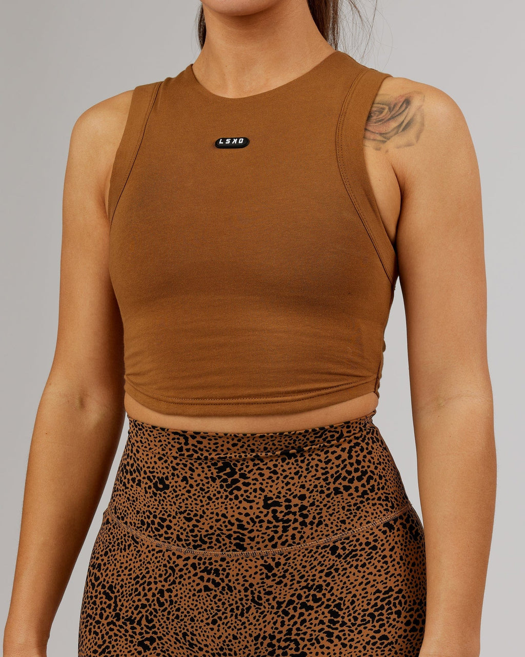 Model wearing Capsule Tank - Camel