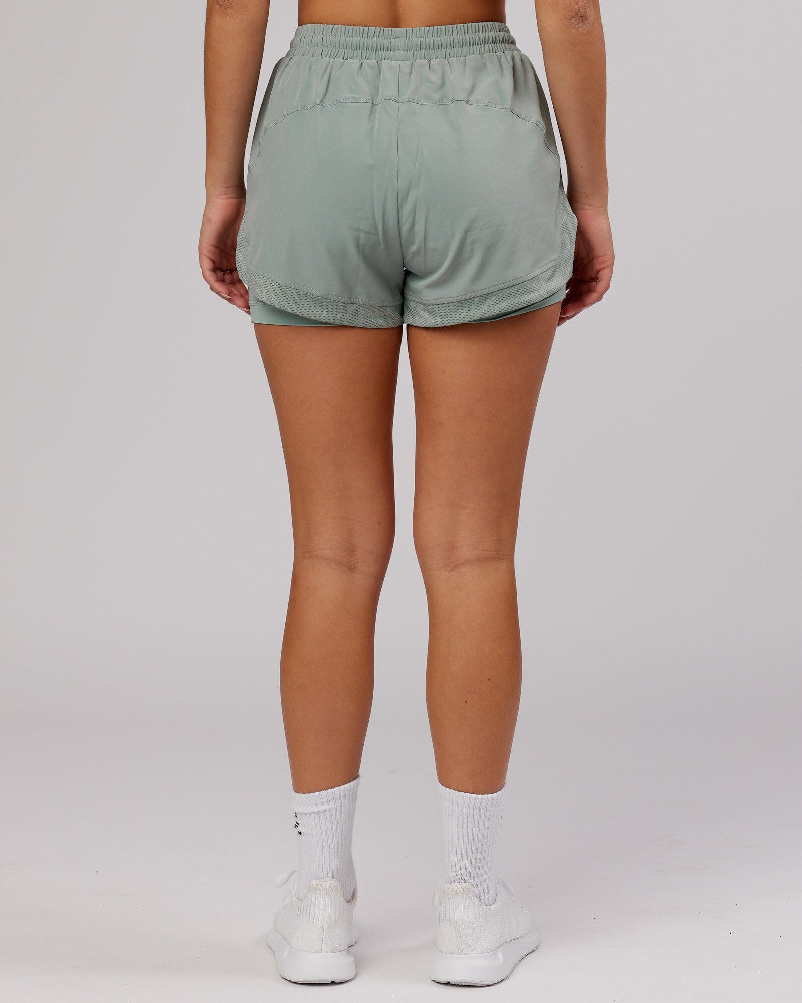 Model wearing Challenger Liner Run Short - Frost