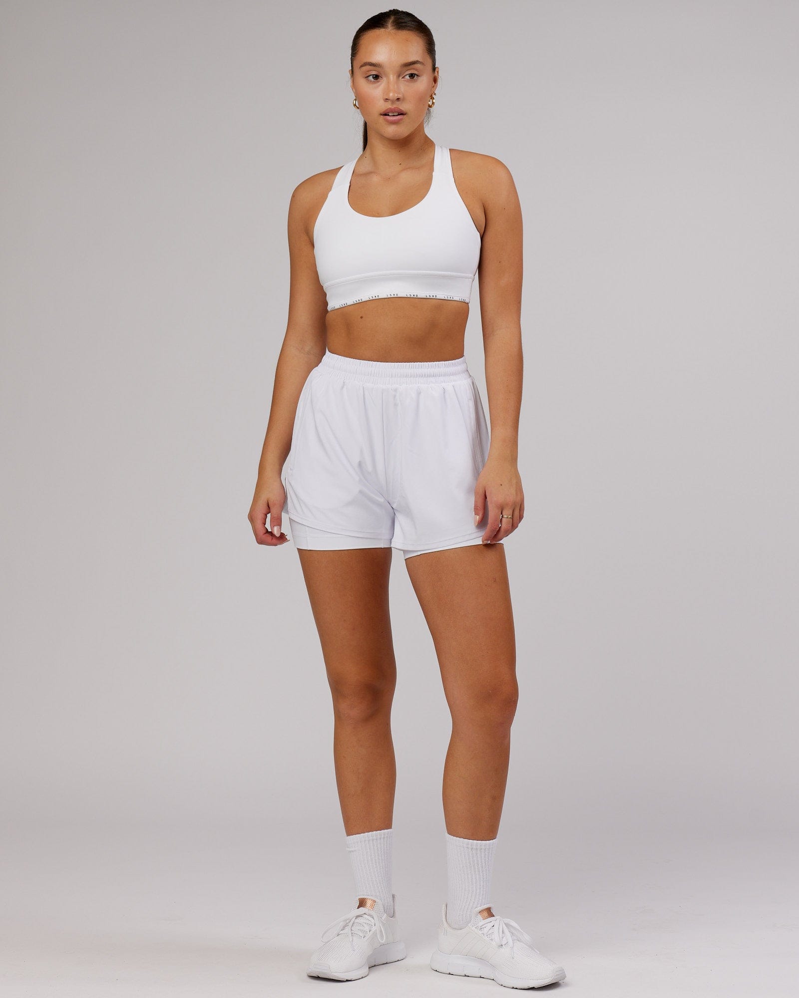 Model wearing Challenger Liner Run Short - White