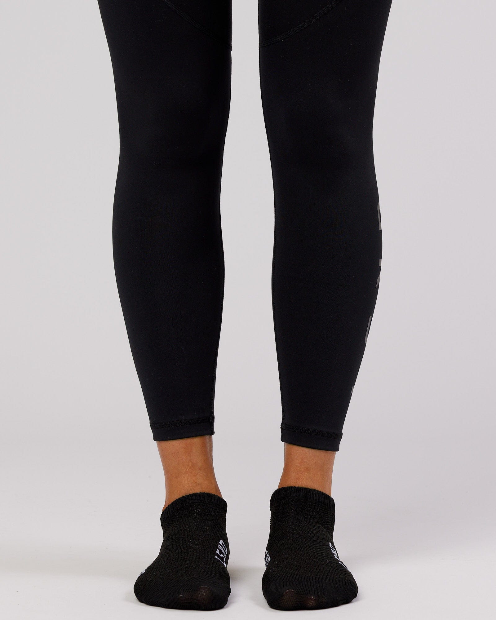 Model wearing Womens 3 Pack Covert Ankle Sock - Black