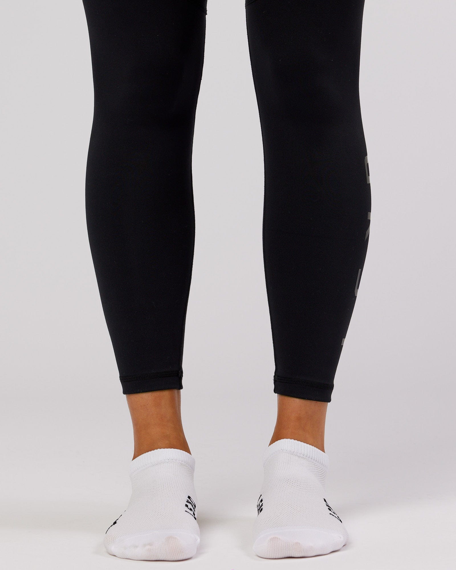 Model wearing Womens 3 Pack Covert Ankle Sock - White