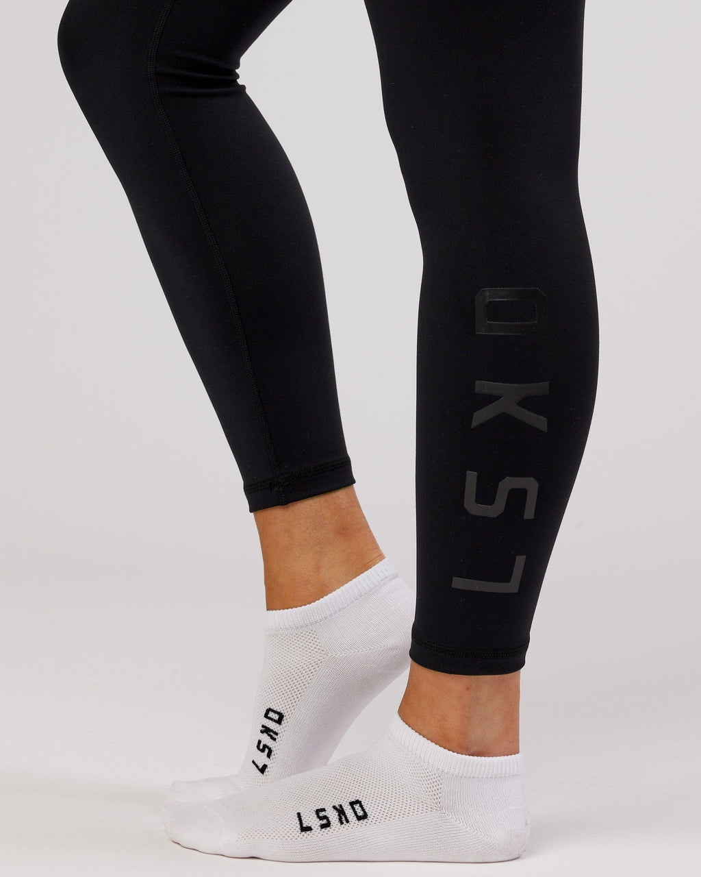 Model wearing Womens 3 Pack Covert Ankle Sock - White