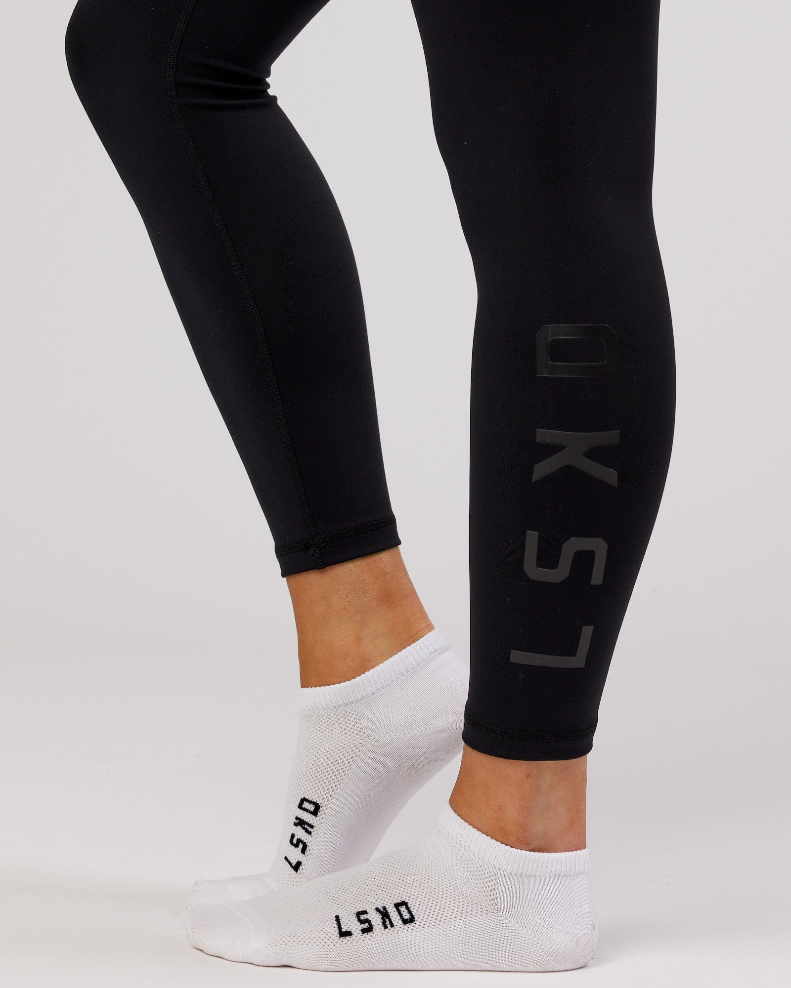 Model wearing Womens 3 Pack Covert Ankle Sock - White