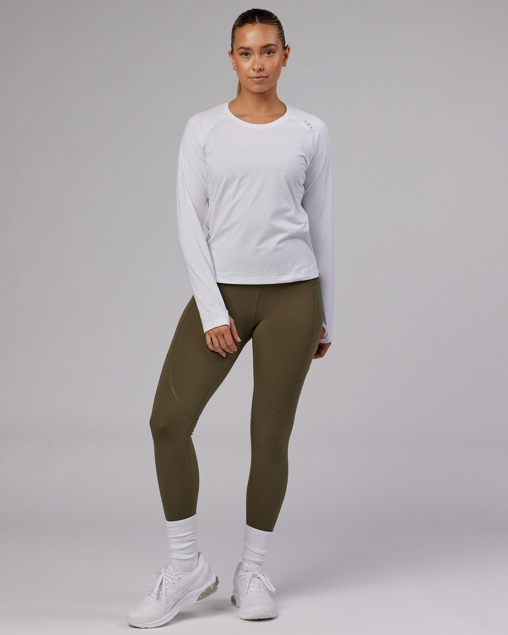 Model wearing Perform VapourFLX LS Tee - White Marl