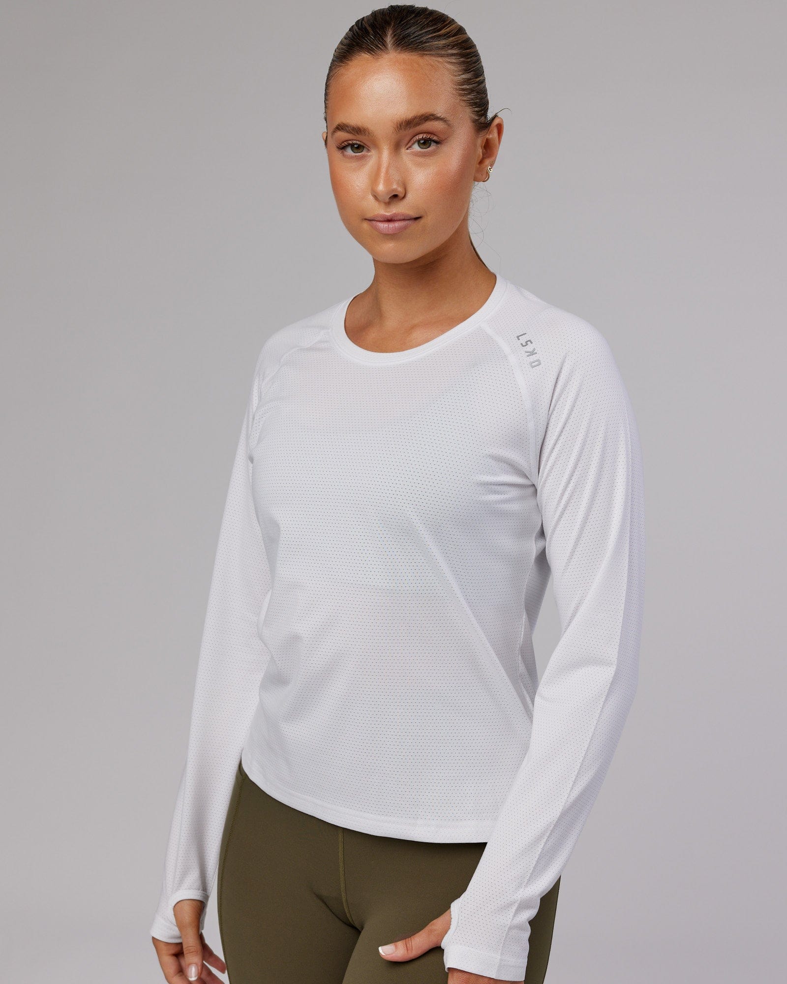 Model wearing Perform VapourFLX LS Tee - White Marl