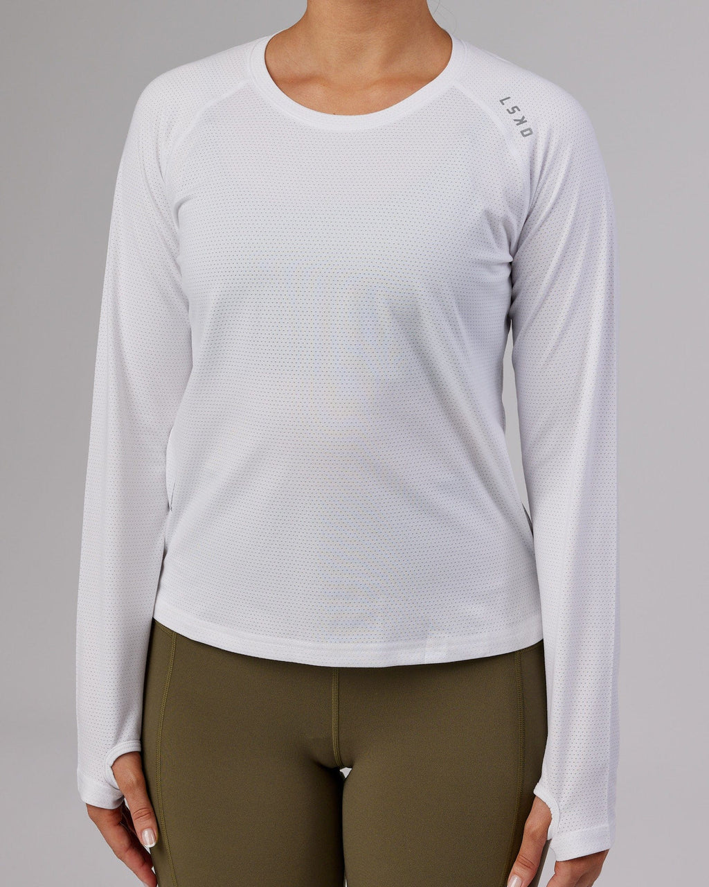 Model wearing Perform VapourFLX LS Tee - White Marl