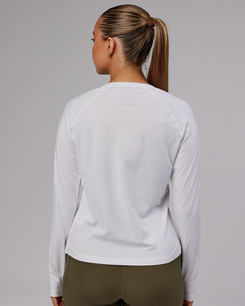 Model wearing Perform VapourFLX LS Tee - White Marl