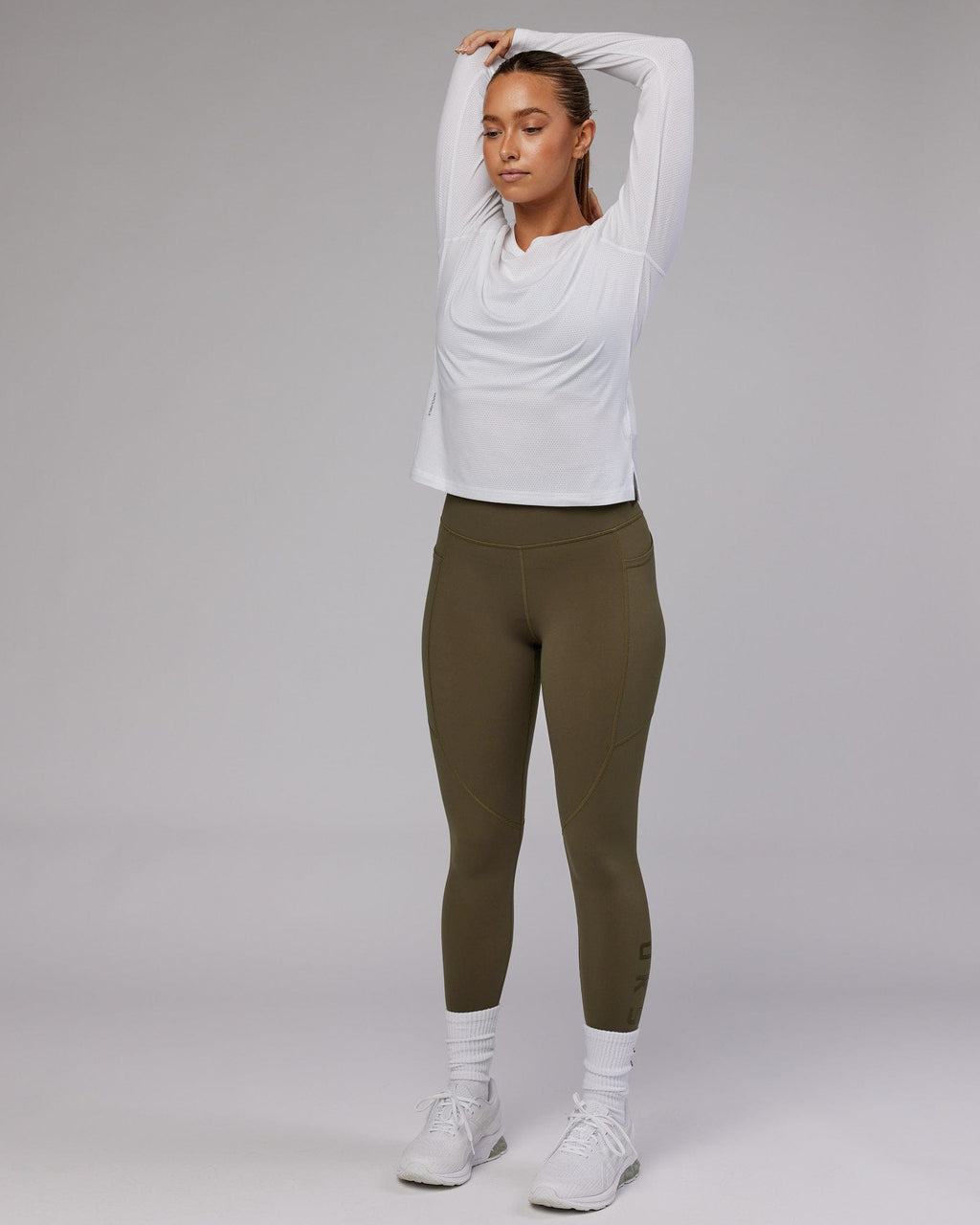 Model wearing Perform VapourFLX LS Tee - White Marl