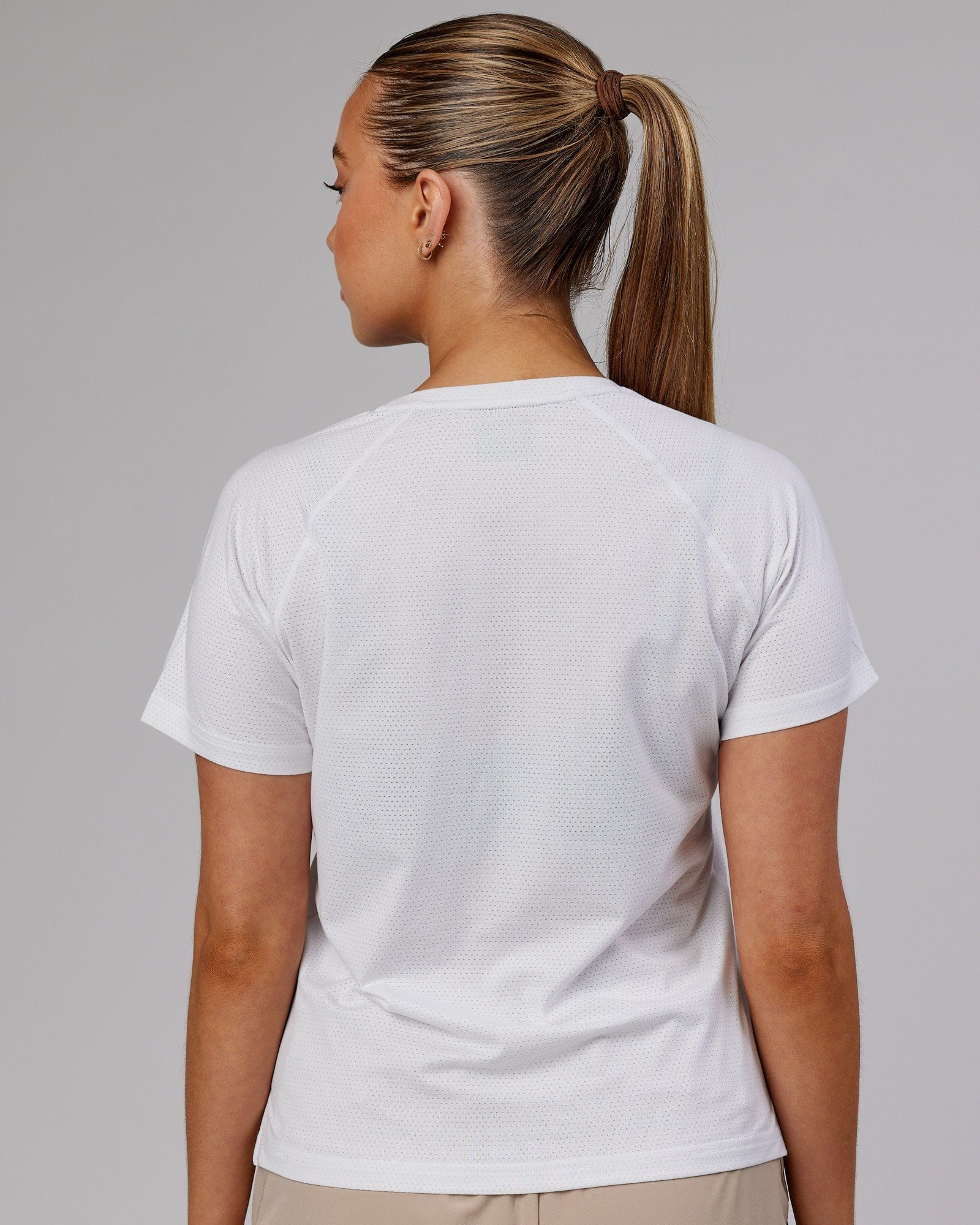 Model wearing Perform VapourFLX Tee - White Marl