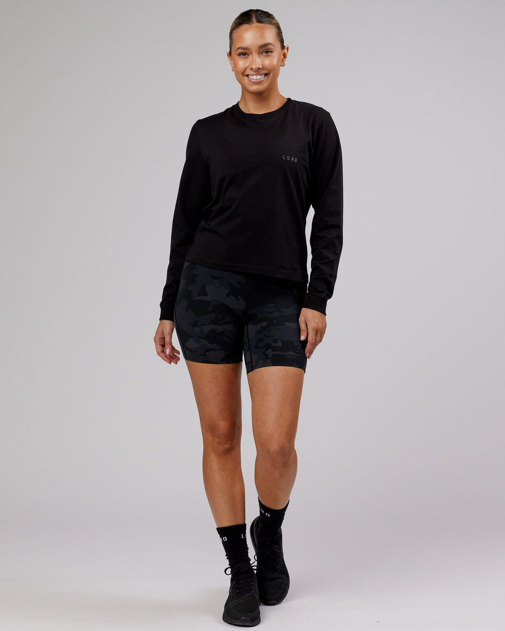 Model wearing Deluxe PimaFLX LS Tee - Black