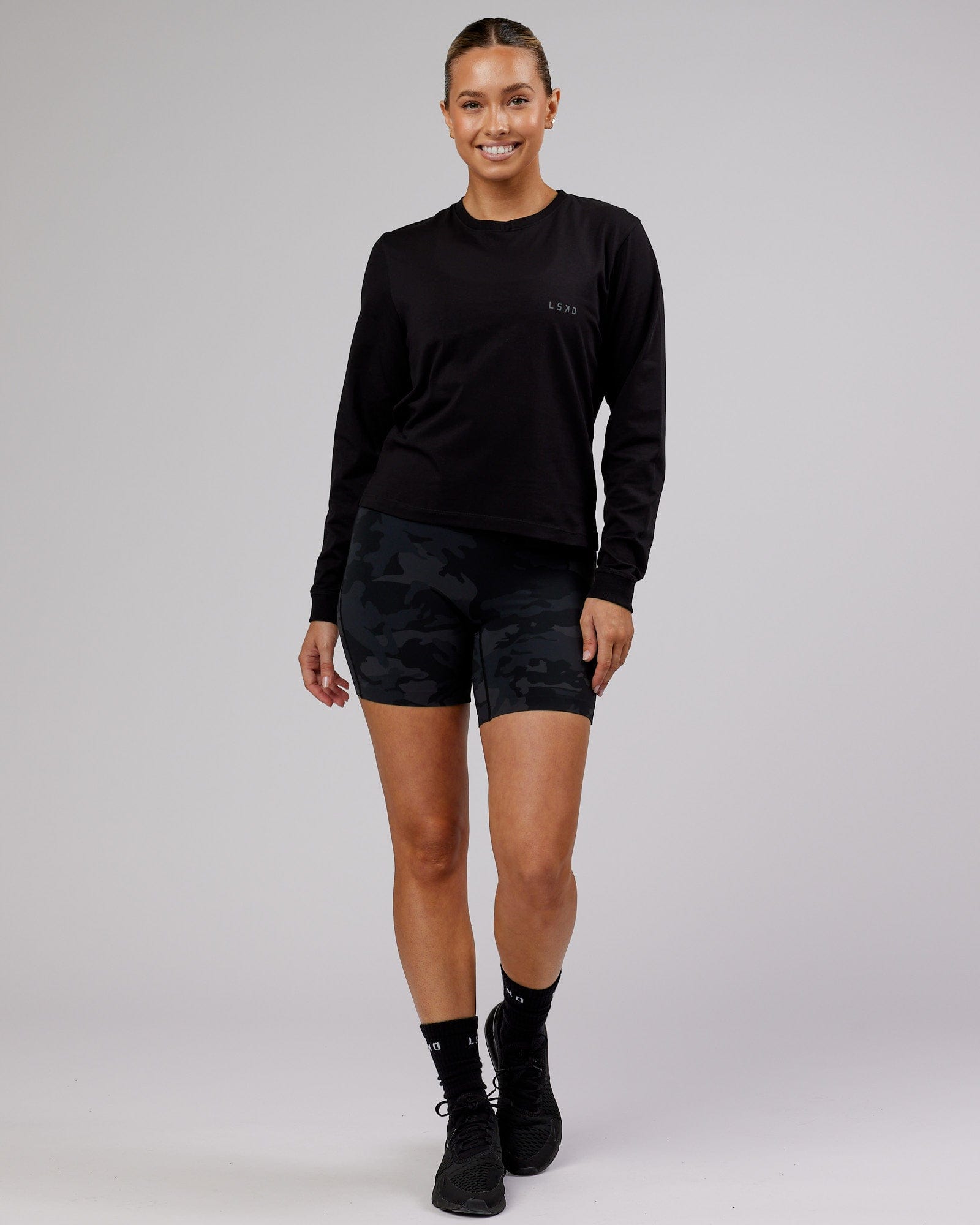 Model wearing Deluxe PimaFLX LS Tee - Black