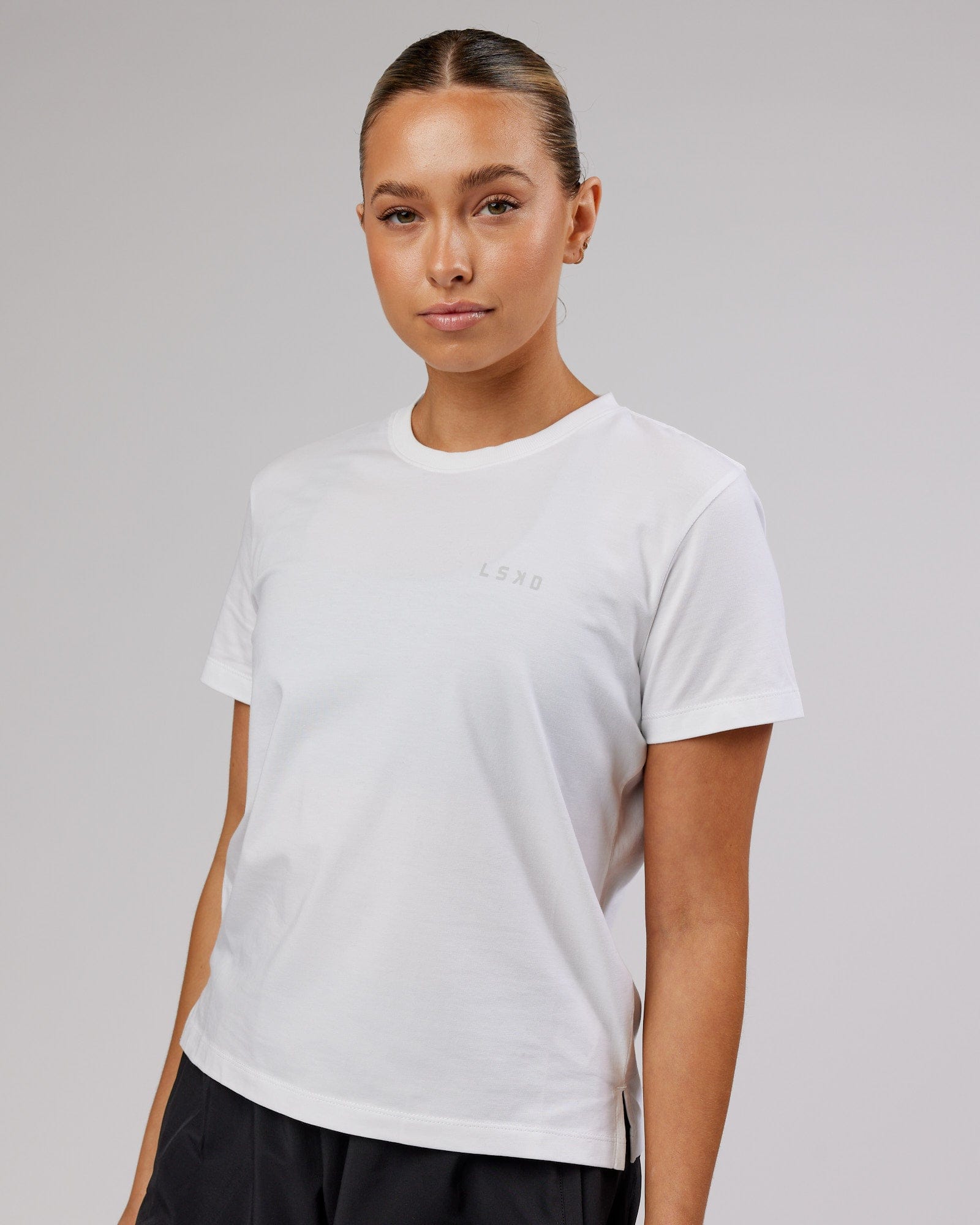 Model wearing Deluxe PimaFLX Tee - White