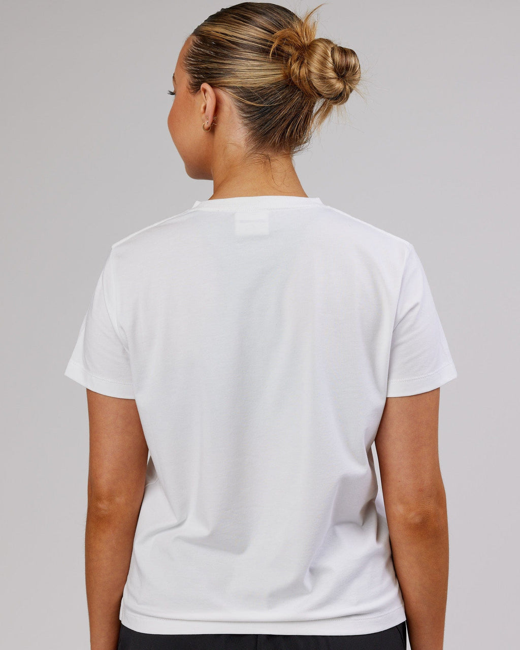 Model wearing Deluxe PimaFLX Tee - White