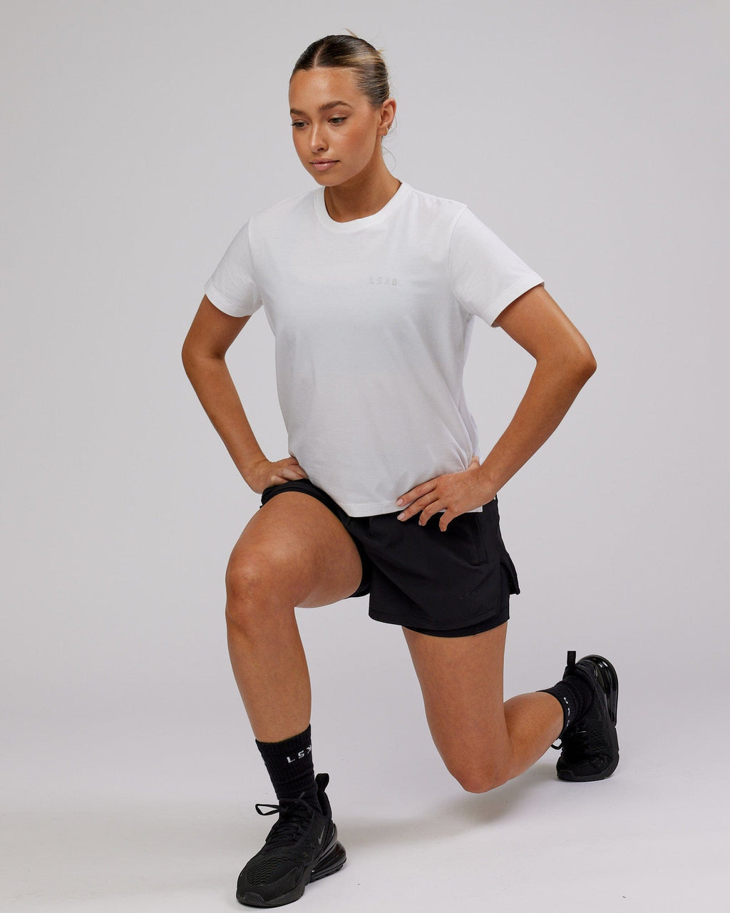 Model wearing Deluxe PimaFLX Tee - White