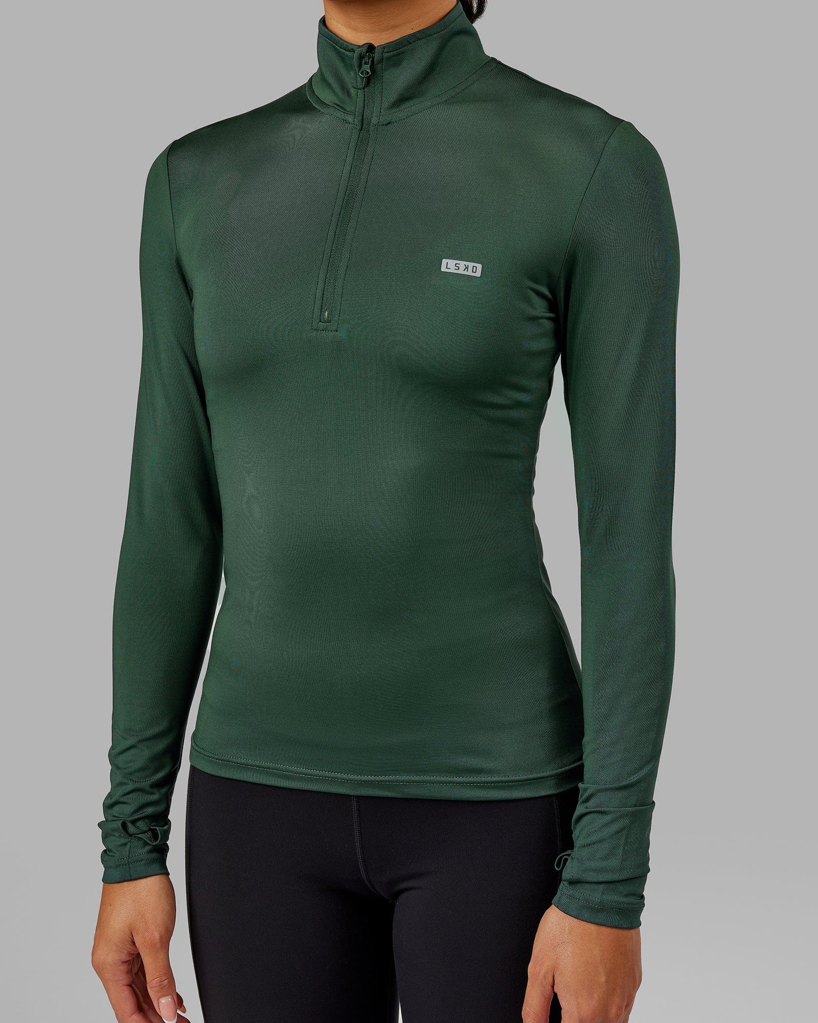 Model wearing Streamlined 1/4 Zip LS Top - Vital Green
