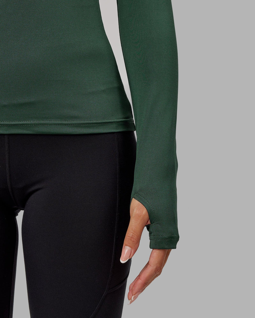 Model wearing Streamlined 1/4 Zip LS Top - Vital Green