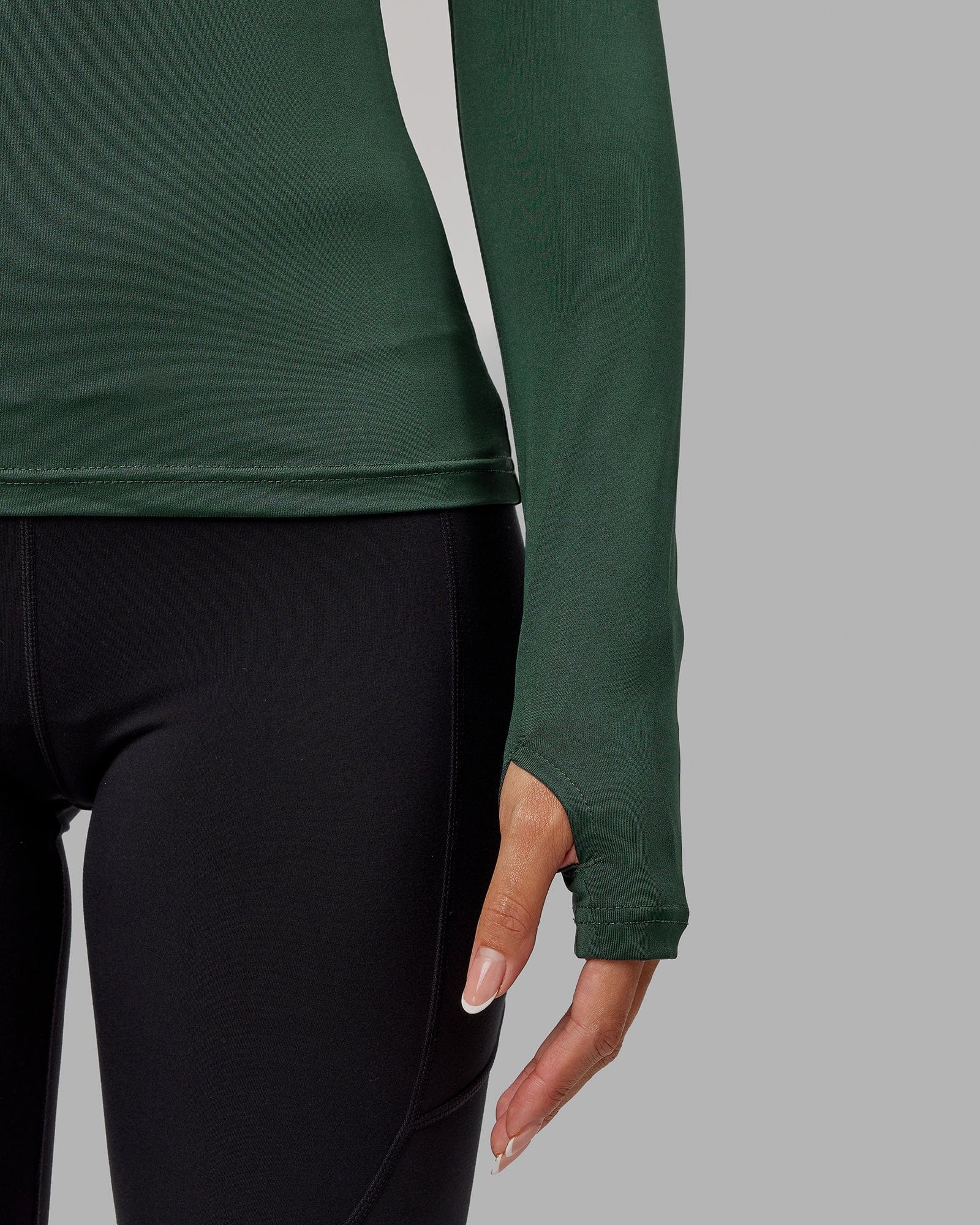 Model wearing Streamlined 1/4 Zip LS Top - Vital Green