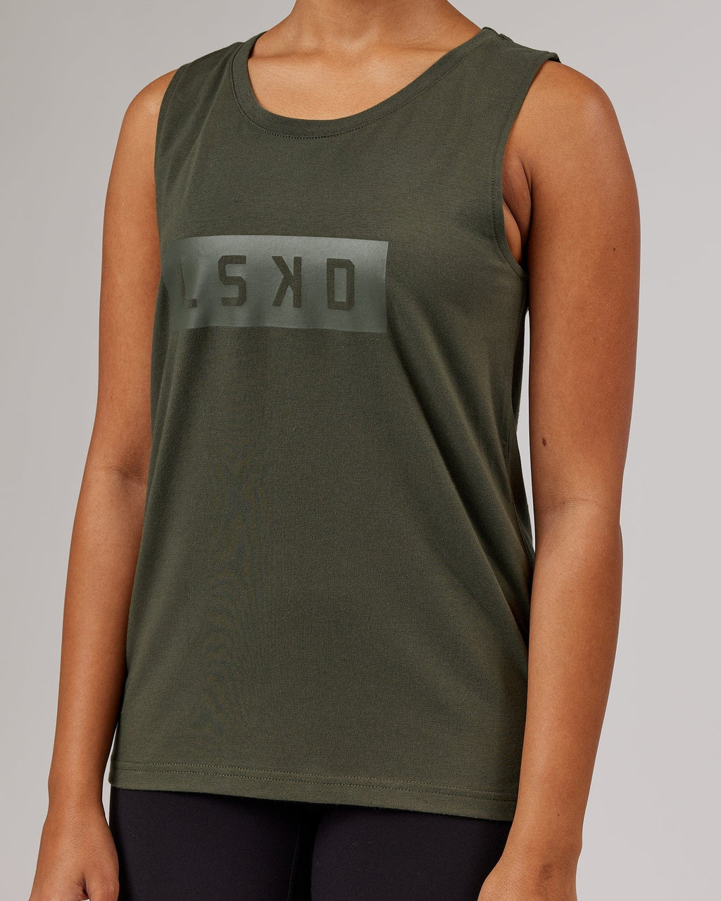 Model wearing Strength FLXDRY Performance Tank - Forest Night