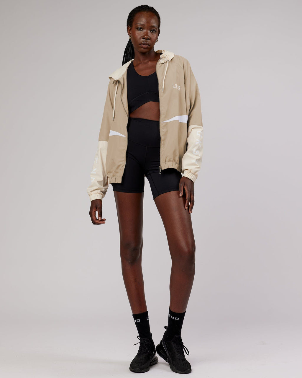 Model wearing Trackside Jacket - Light Fawn