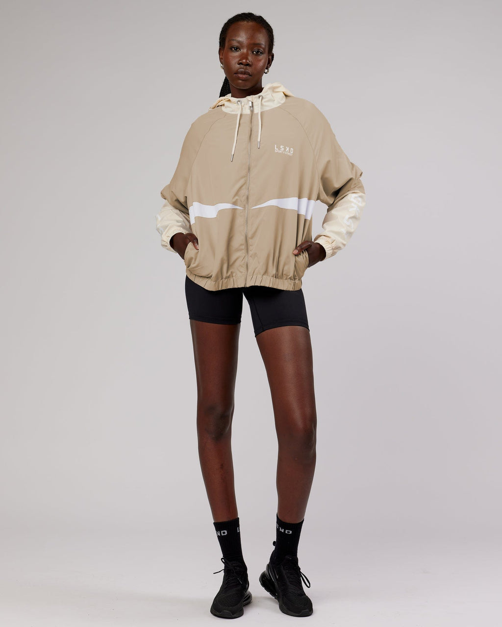 Model wearing Trackside Jacket - Light Fawn