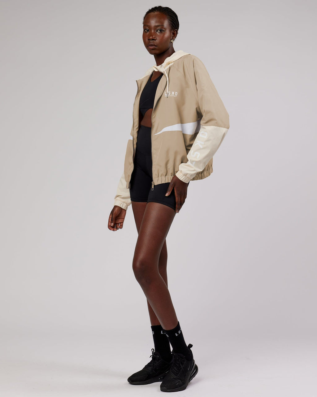 Model wearing Trackside Jacket - Light Fawn