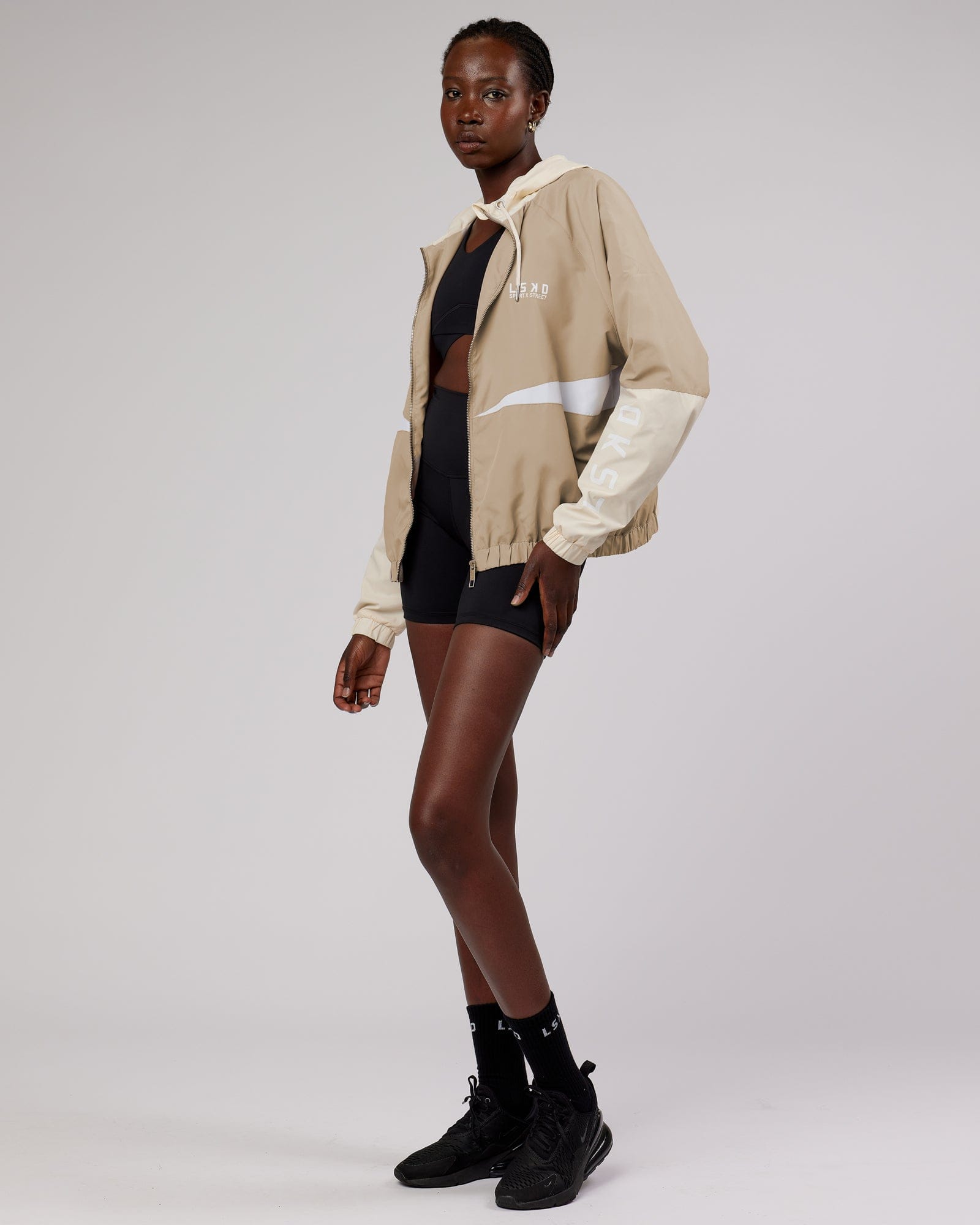 Model wearing Trackside Jacket - Light Fawn