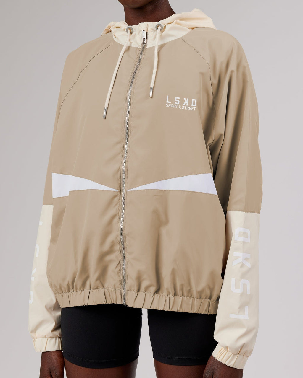 Model wearing Trackside Jacket - Light Fawn