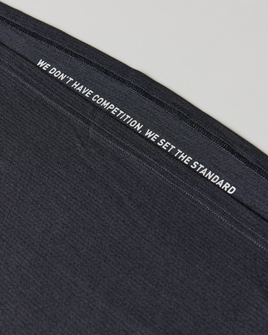 Model wearing Perform VapourFLX LS Tee - Black Marl