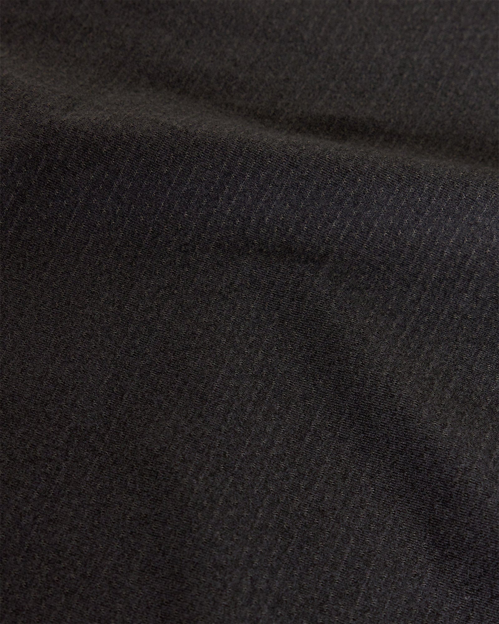 Model wearing Perform VapourFLX LS Tee - Black Marl