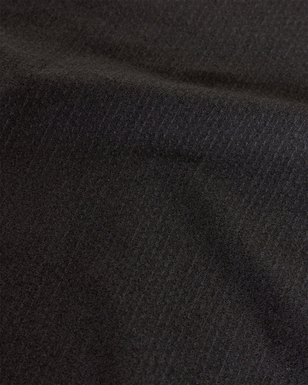 Model wearing Perform VapourFLX LS Tee - Black Marl