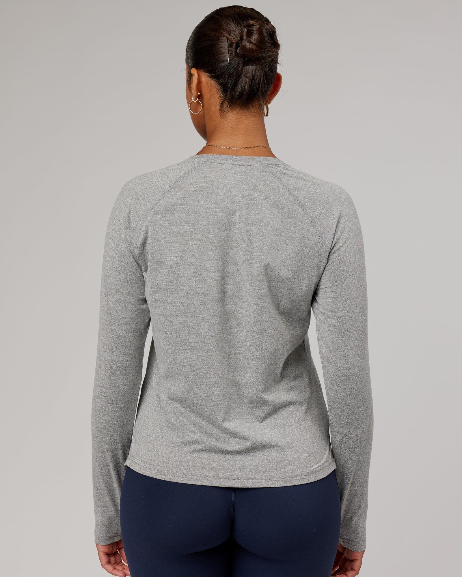 Model wearing Perform VapourFLX LS Tee - Lt Grey Marl