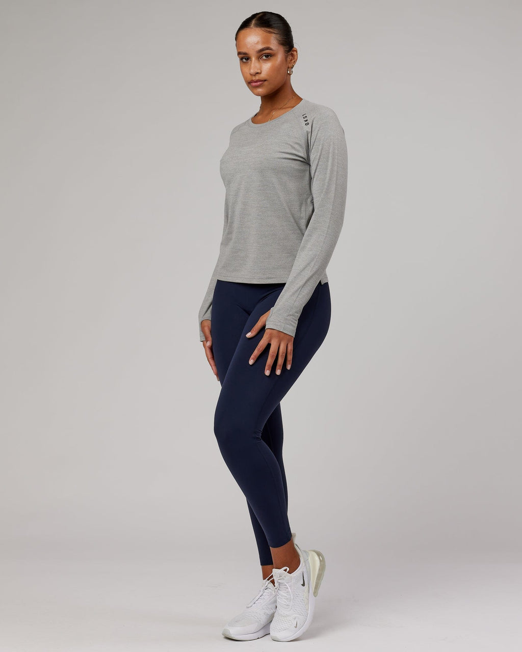 Model wearing Perform VapourFLX LS Tee - Lt Grey Marl