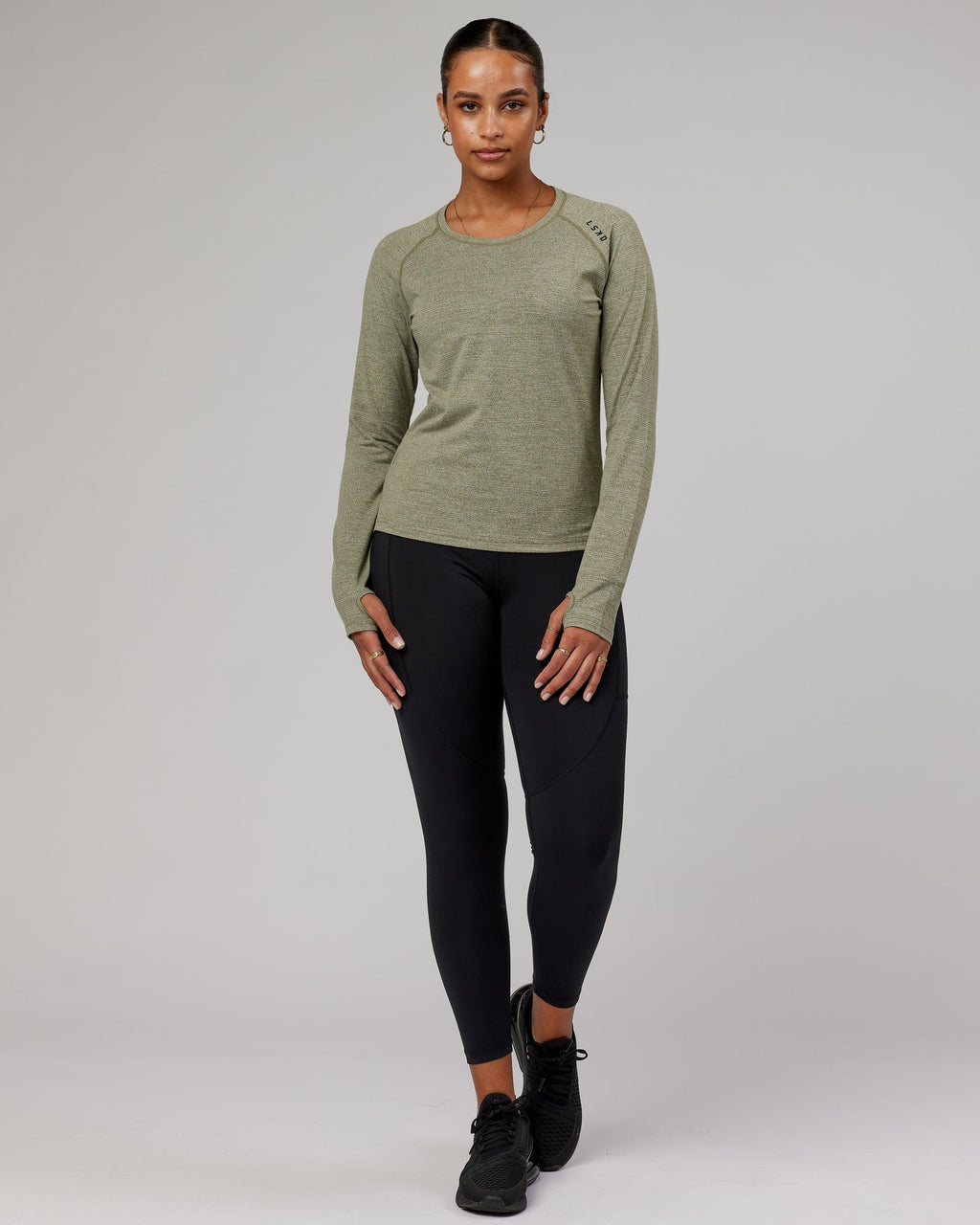 Model wearing Perform VapourFLX LS Tee - Olive Marl